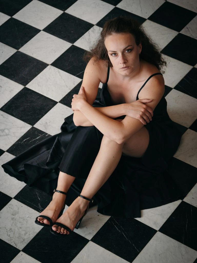 Maren Holloway, founder and editor-in-chief, at her writing desk in the Brooklyn studio